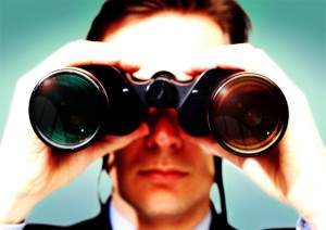 Businessman Using Binoculars